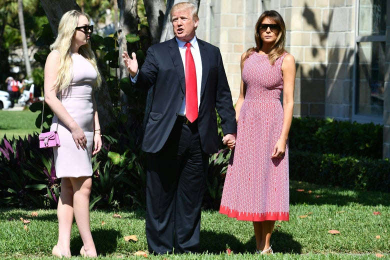 President Donald Trump with First Lady Melania Trump and daughter Tiffany Trump arrive for Easter service at the Church of Bethesda-by-the-Sea in Palm Beach, Florida, April 1, 2018.